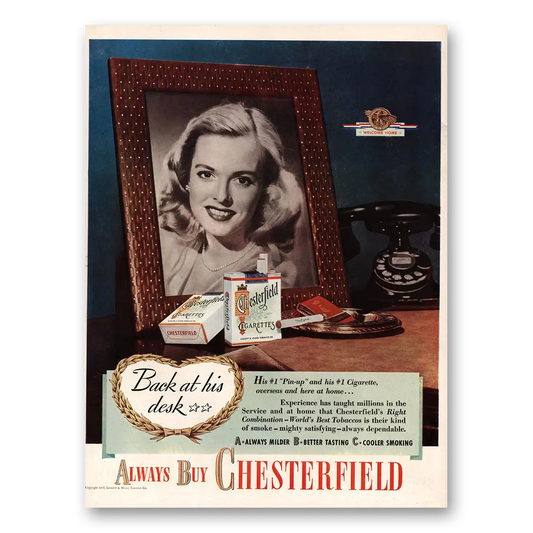 1945 Chesterfield Cigarettes Back at His Desk Pin Up Vintage Magazine Print Ad