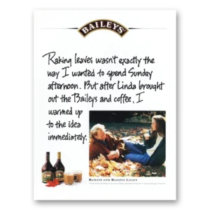 1993 Bailys Irish Cream Print Ad | Raking Leaves
